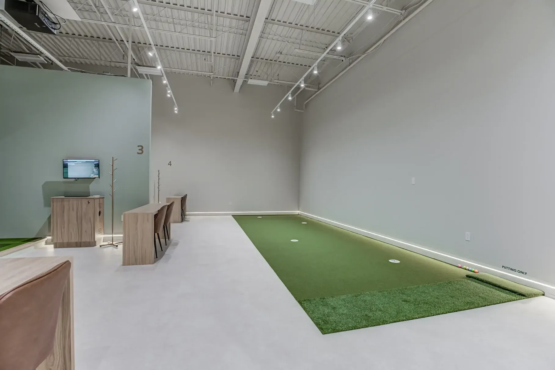 The indoor putting green